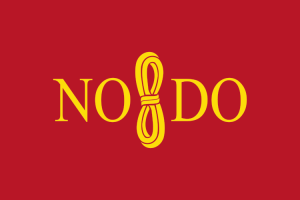 Bandera de Sevilla con el nudo gordiano y el lema NODO.
