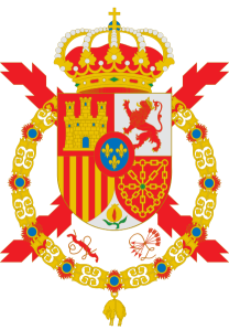 Actual escudo de armas del rey Juan Carlos I de España y donde aparecen el yugo y las flechas.